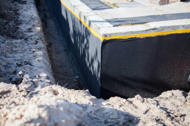 Professional Waterproofing technician working in Ferndale, MD